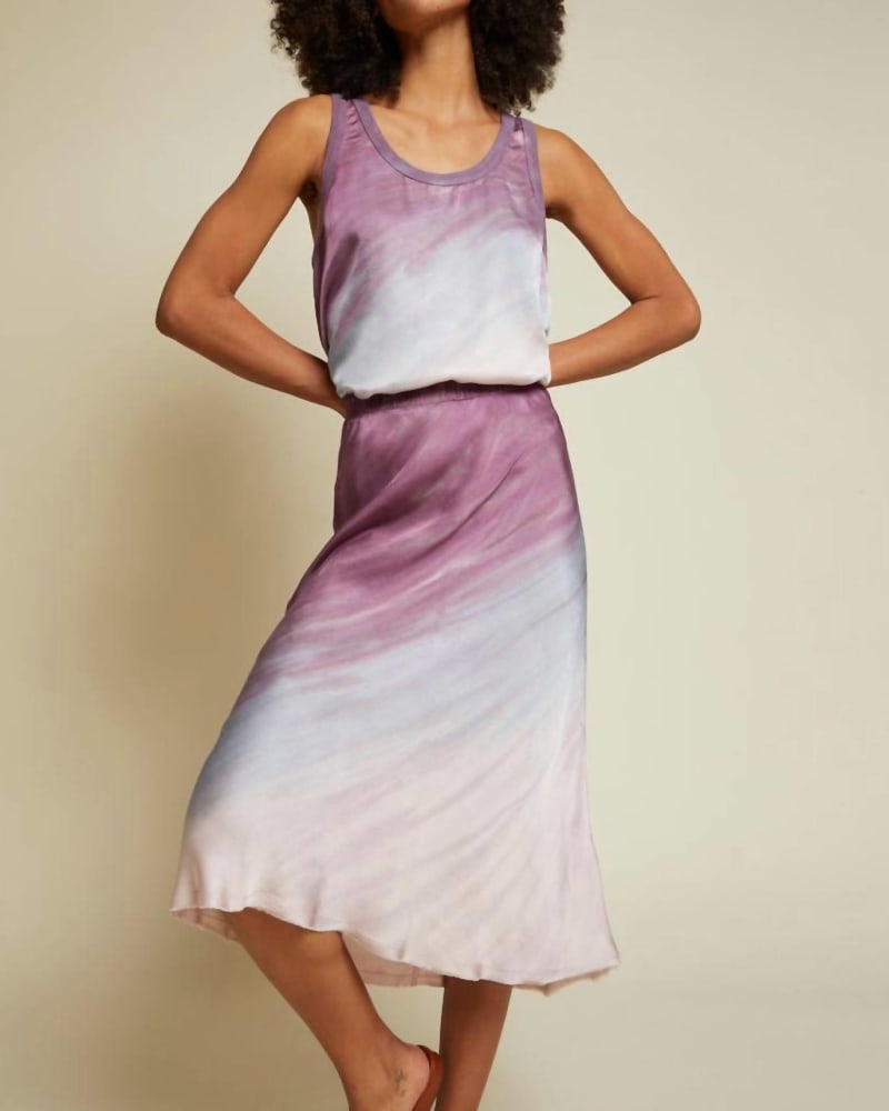 Front of a model wearing a size L Mabel Midi Skirt in Mood Ring Tie Dye in Mood Ring Tie Dye by Nation LTD. | dia_product_style_image_id:338579